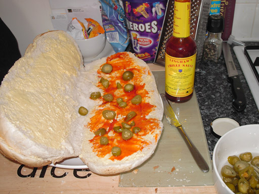 Apply the jalapeno chillies liberally (to taste) to the lower layer of the manwich