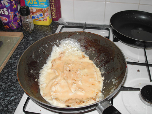 Whisk the eggs into an omelette mixture and add to the frying pan